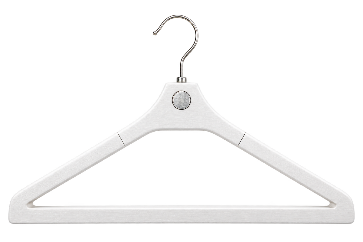 White Attraxis suit hanger, rear view showing the exposed circular magnet